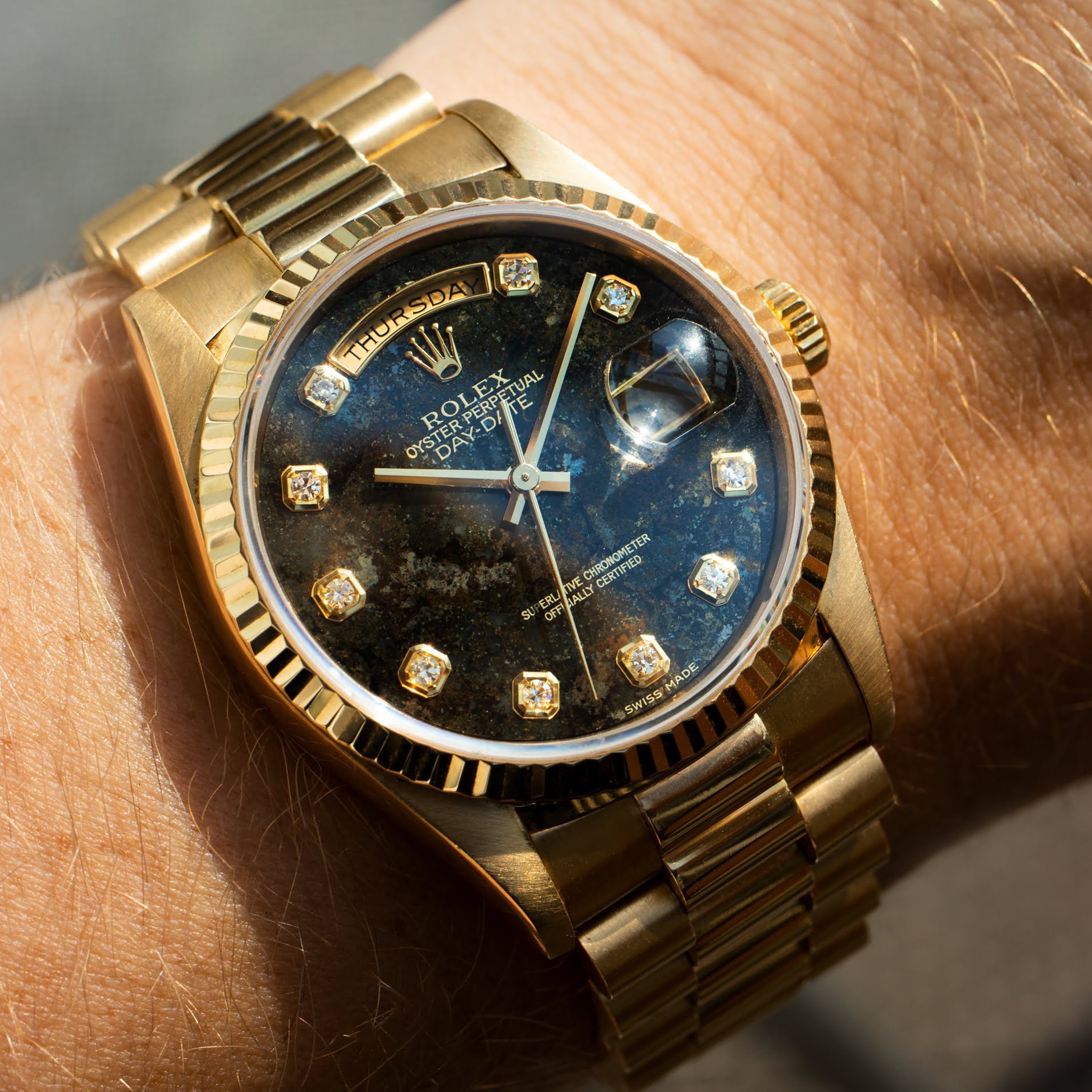 rolex gold day date onyx dial no markers