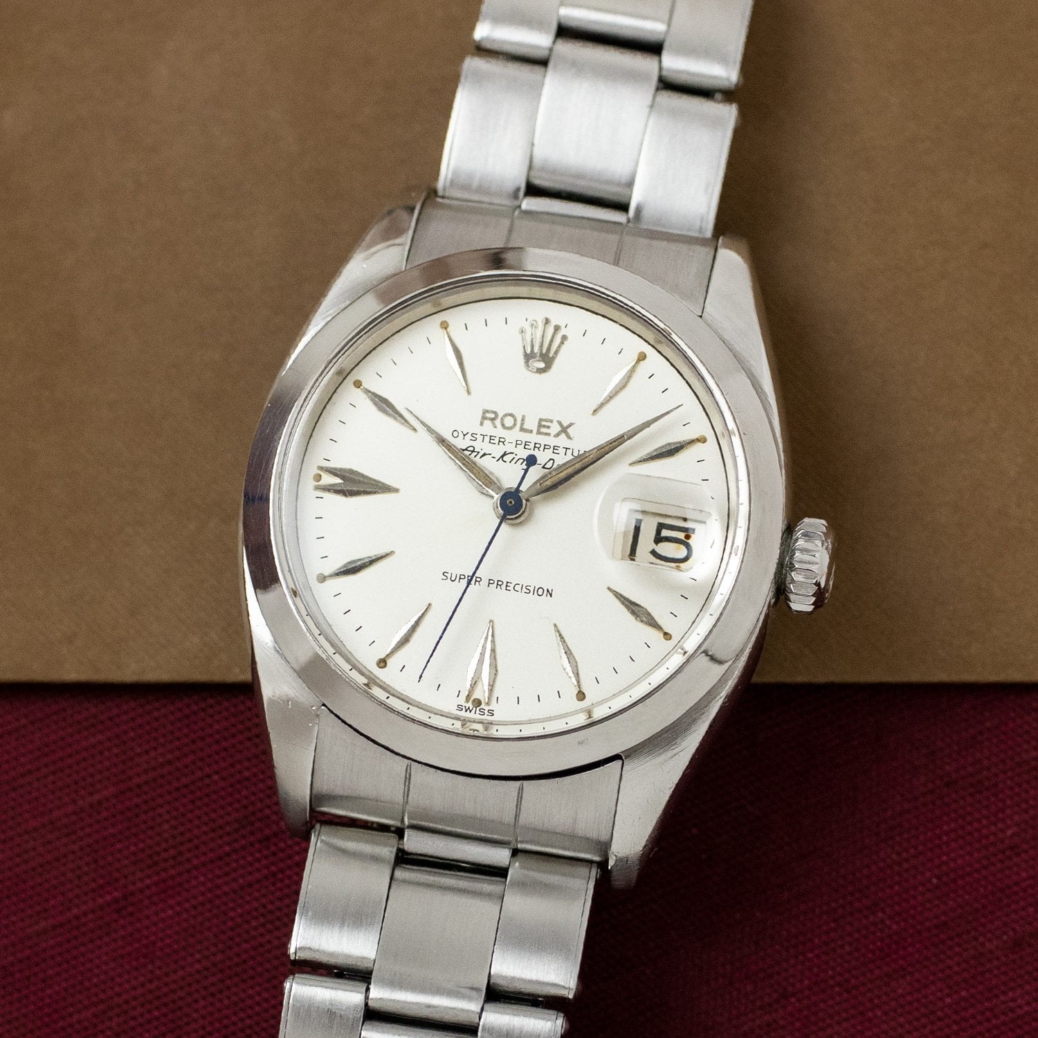 Rolex 5700 — Lozenge and Arrowhead Markers. Photographed dealer specimen. Documented example: 1960. Production span has not been established. · Photo: Amsterdam Vintage Watches · © Amsterdam Vintage Watches, used with permission · Source: https://amsterdamvintagewatches.com/shop/rolex-air-king-date-5700/