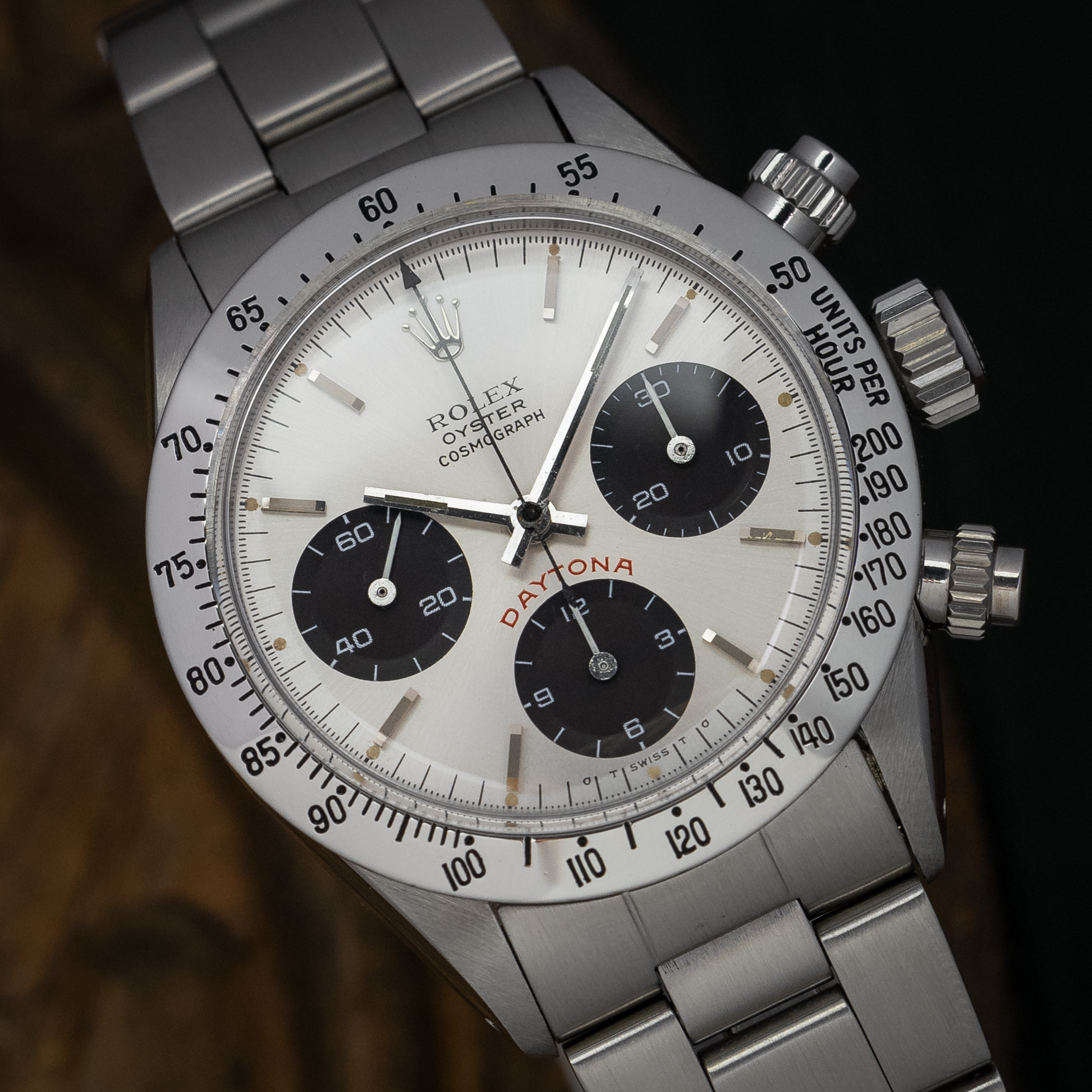 Rolex 6265 — Big Red Sigma. Photographed dealer specimen. Documented example: 1975. Production span has not been established. · Photo: Amsterdam Vintage Watches · © Amsterdam Vintage Watches, used with permission · Source: https://amsterdamvintagewatches.com/shop/rolex-daytona-6265-big-red-7/