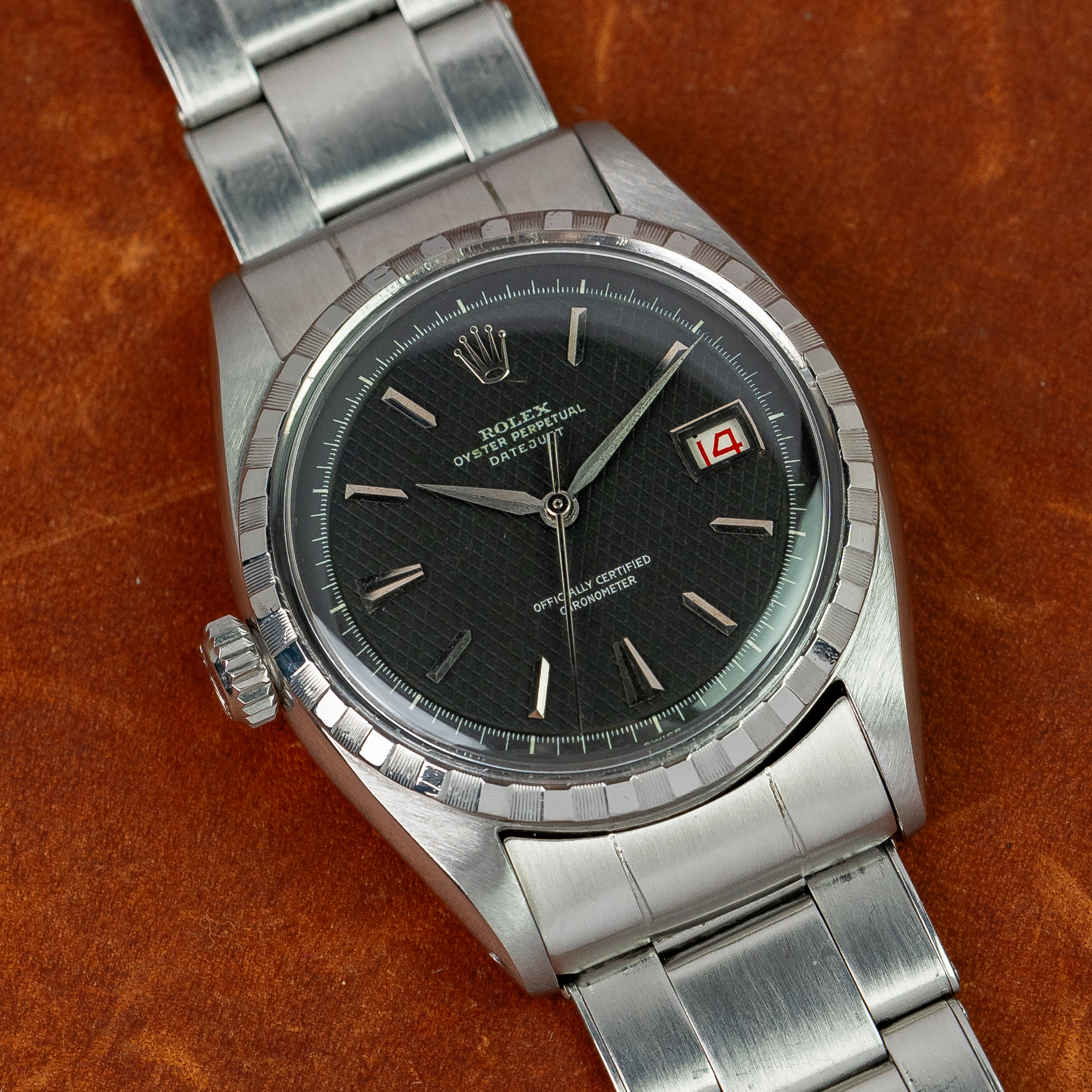 Rolex 6305 — Black Honeycomb Dial, Left-Hand Crown. Photographed dealer specimen. Documented example: 1955. Production span has not been established. · Photo: Amsterdam Vintage Watches · © Amsterdam Vintage Watches, used with permission · Source: https://amsterdamvintagewatches.com/shop/rolex-datejust-6305-2-leftie/