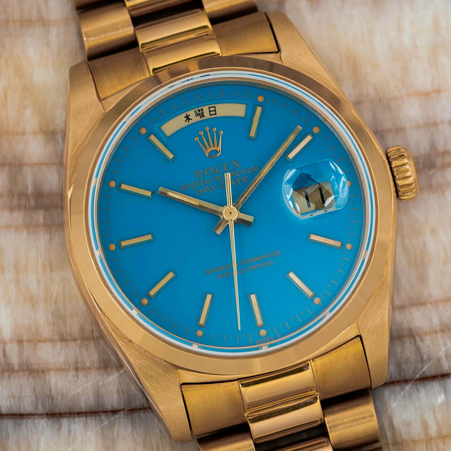 Rolex 18028 — Blue Stella Lacquer Dial. Photographed dealer specimen. Documented example: 1978. Production span has not been established. · Photo: Amsterdam Vintage Watches · © Amsterdam Vintage Watches, used with permission · Source: https://amsterdamvintagewatches.com/shop/rolex-day-date-18028-2/